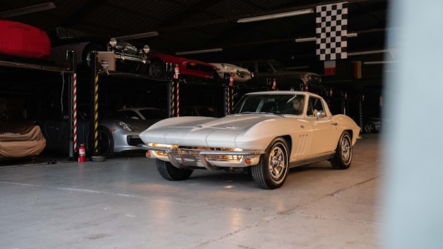 white corvette in garage
