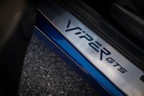 A sleek metal Viper GTS door sill.